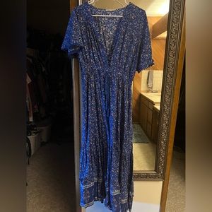 Beautiful Floral short sleeve dress. Never been worn but I removed tags.